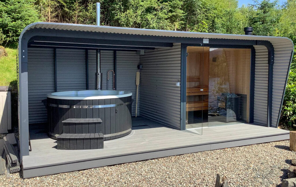 Full outdoor wellness setup with hot tub and sauna at Loch Katrine